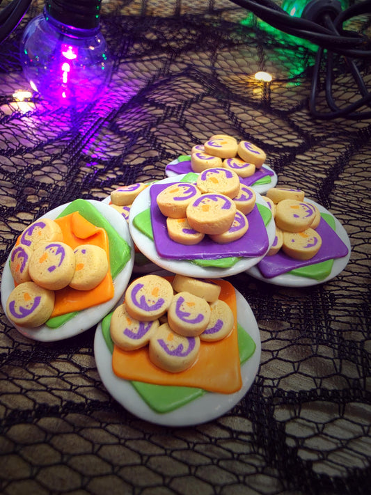 Miniature Halloween ghost cookie plates with purple/green and orange/green napkins, polymer clay dollhouse food